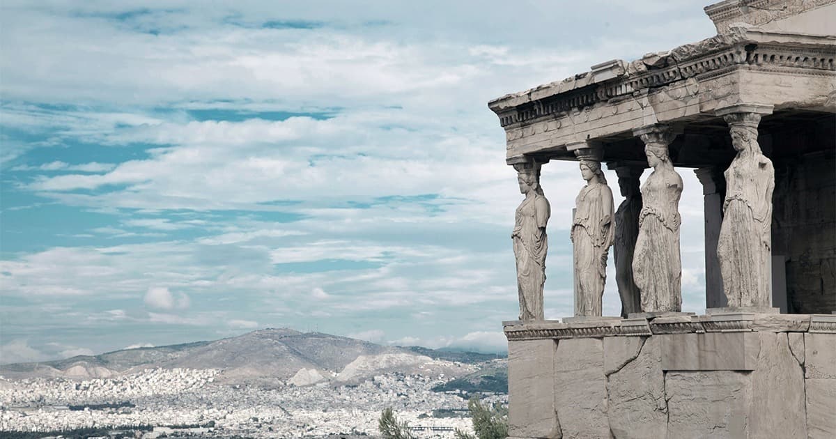 Parthenon on the Acropolis lit by the setting sun.