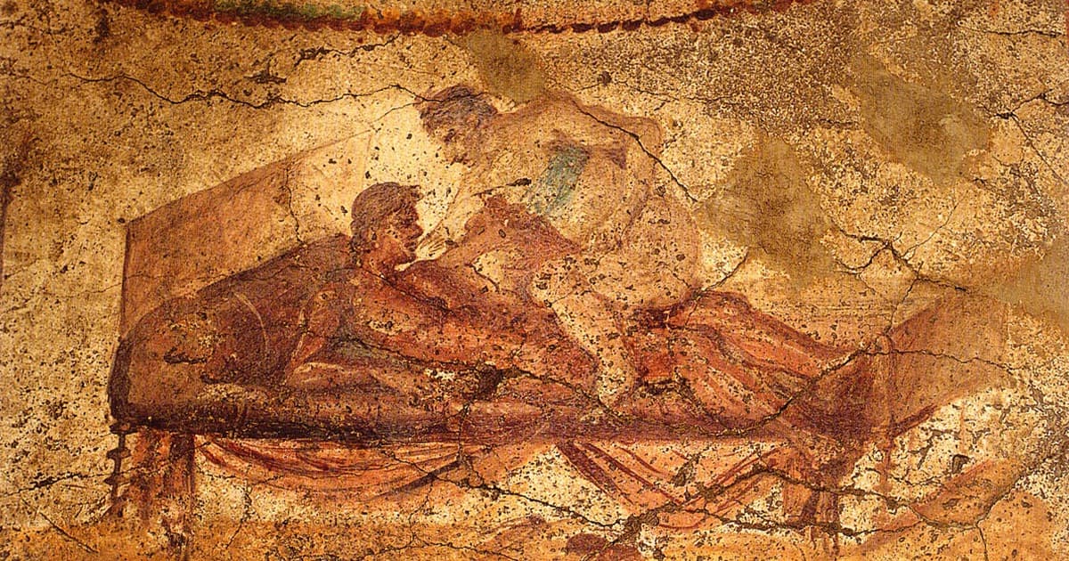 Erotic wall painting in the Lupanar at Pompeii, showing a couple on a bed.